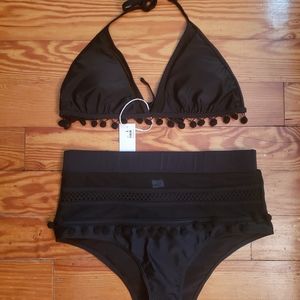 Pom Pom bathing suit.